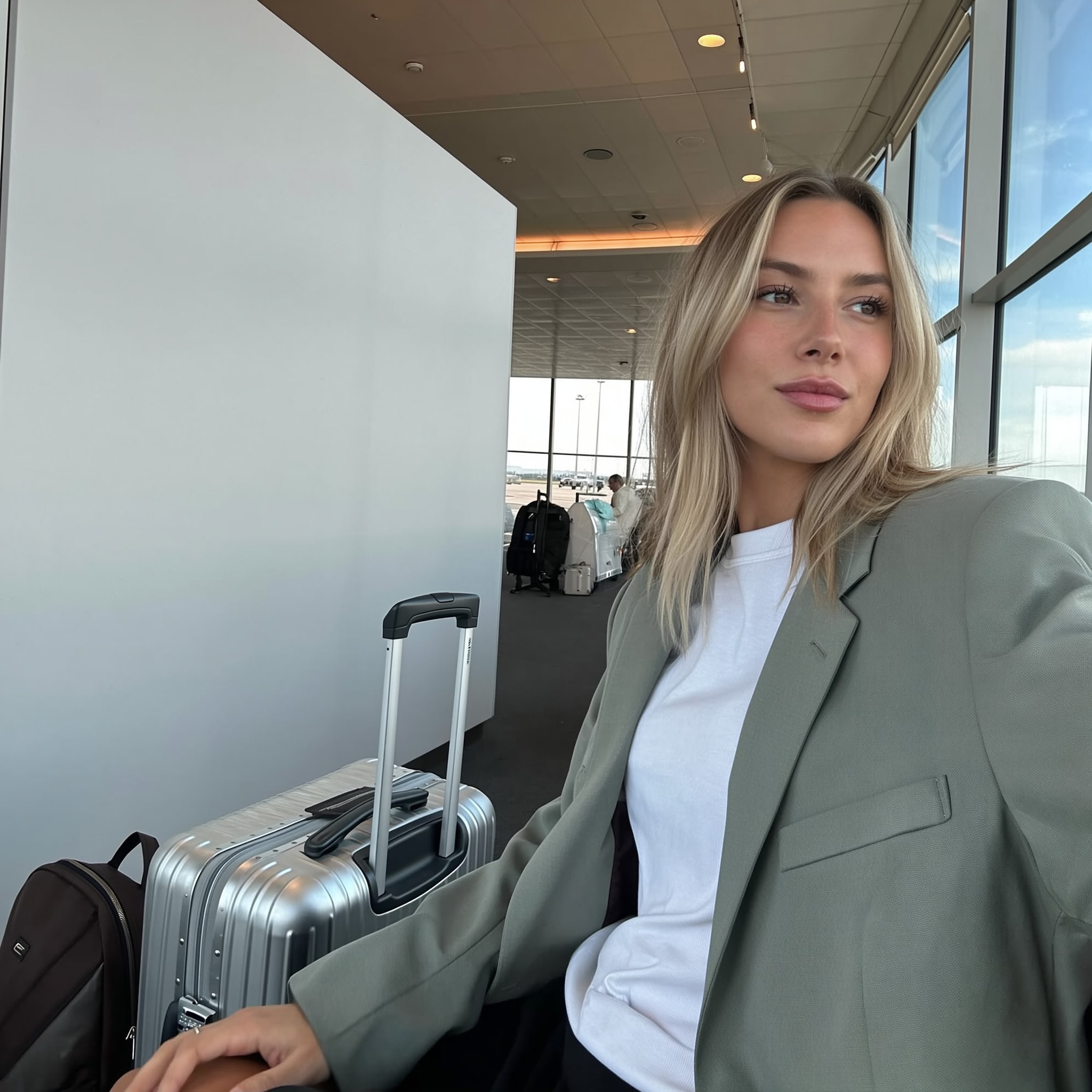 Emma in grey blazer